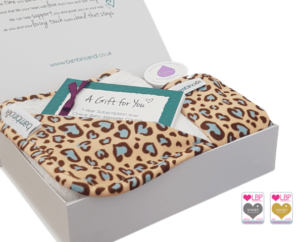 Baby massage kit gift for newborn new mum new dad. The kit includes a leopard print baby massage mat, the bumbino, kokoso coconut oil, baby massage guide, online baby massage course