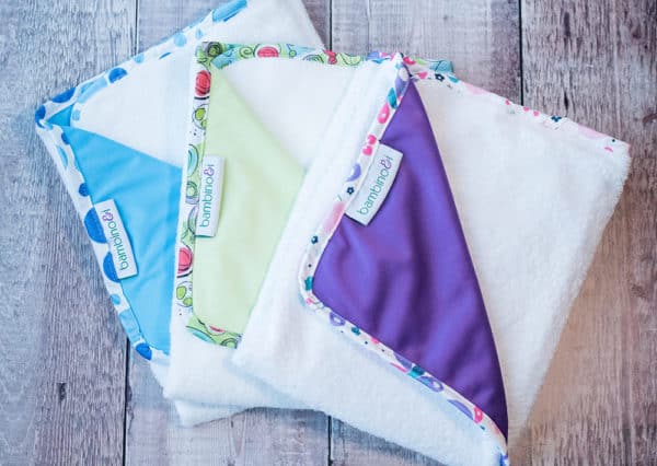 Picture of a green, blue and purple baby massage mat/infant massage mat