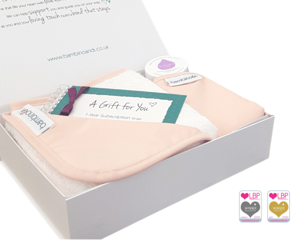 Baby massage kit gift for newborn new mum new dad. The kit includes a nude colour baby massage mat, the bumbino, kokoso coconut oil, baby massage guide, online baby massage course