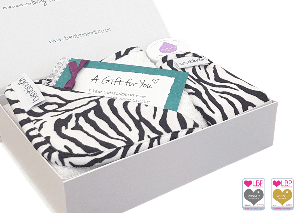 Baby massage kit gift for newborn new mum new dad. The kit includes a zebra print baby massage mat, the bumbino, kokoso coconut oil, baby massage guide, online baby massage course
